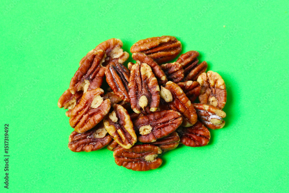 Delicious salted pecan nuts scattered. Delicious salted pecan nuts scattered.
