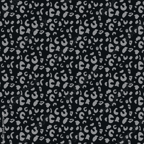 Moody and modern, this reversed take on leopard spots uses grey on charcoal black for a futuristic twist.