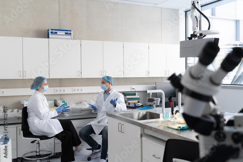 Scientists Conversation At Ethical Animal Research Lab