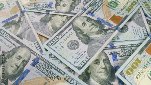 Картината върху платно A sizable pile of freshly minted one hundred dollar bills ready for transactions