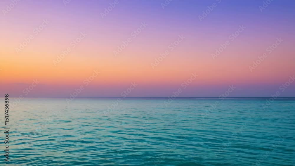Turquoise Ocean Under Vibrant Gradient Sunset Sky In Shades of Orange Pink And Purple Turquoise Ocean Under Vibrant Gradient Sunset Sky In Shades of Orange Pink And Purple