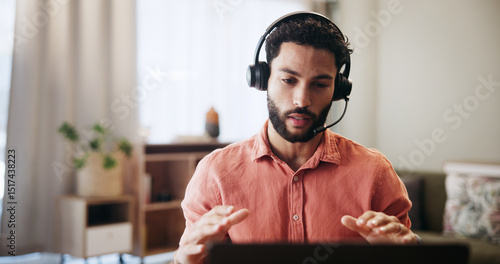 Foto Man, headset and laptop in home for remote work, virtual receptionist or assistant for help
