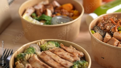Having a lunch break at the office with delicious Healthy food delivery in take away boxes, Healthy eating concept. dolly shot.