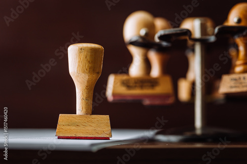 Wooden Rubber stamp on office desk. 