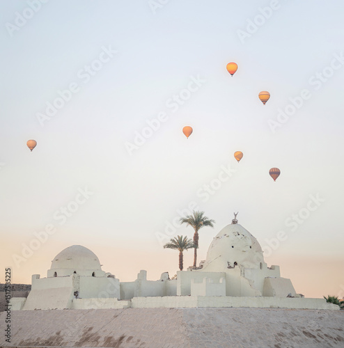 Hot Air Balloons Over Ancient Architecture