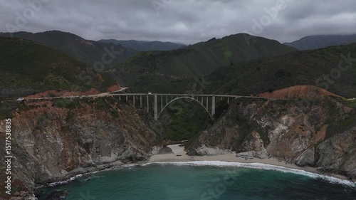 4K Aerial Drone Footage of Cars Crossing Bixby Creek Bridge on California’s Big Sur Coast with Ocean Below