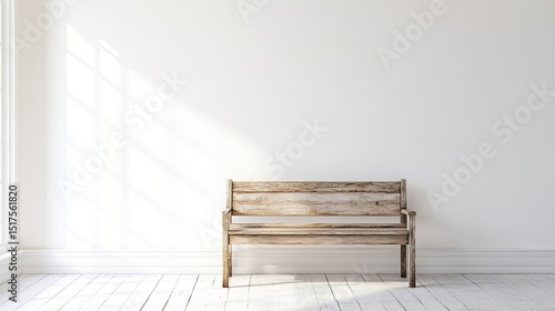 Simple wooden bench in front of clean white wall