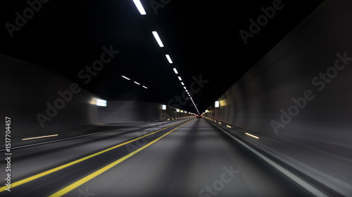 Blurred motion of car in illuminated tunnel