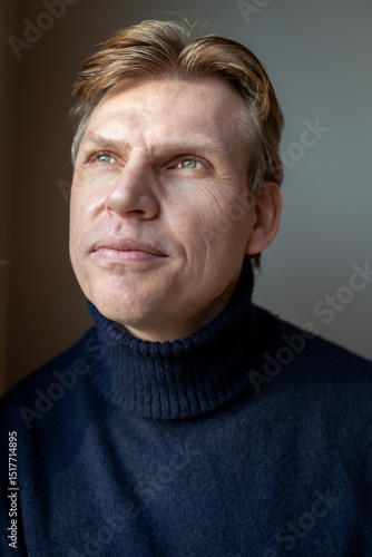 Wallpaper Mural Thoughtful mature man wearing turtleneck Torontodigital.ca