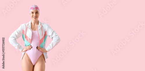 Female swimmer on pink back...