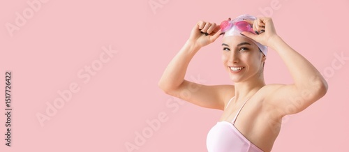 Female swimmer on pink back...