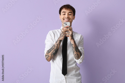 Happy young man in shirt wi...
