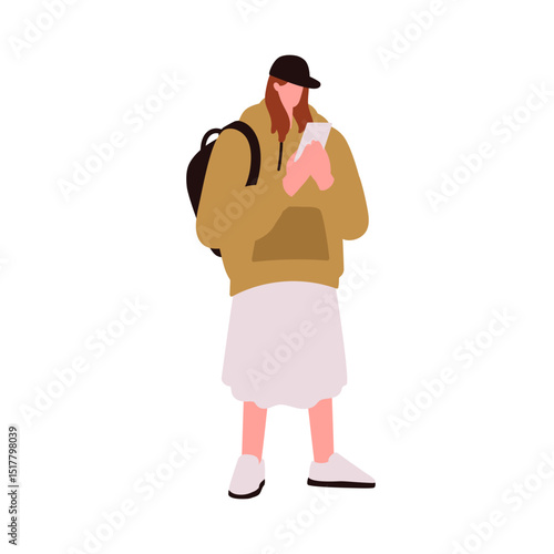 Girl with mobile phone in hand, standing outdoors. Modern female holding smar...