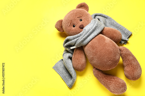 Teddy bear with warm scarf ...