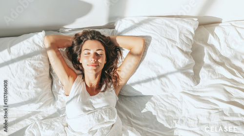 Peaceful woman sleeping soundly, bathed in morning sunlight, resting on soft white bedding, looking serene and rejuvenated