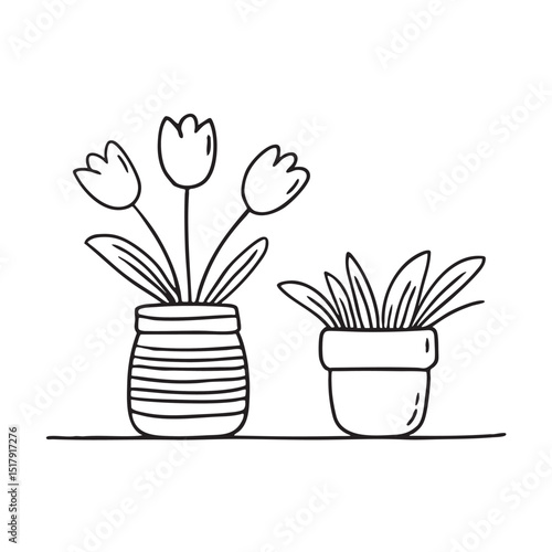 Tulips arranged near a small pot