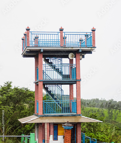 Yogyakarta, Indonesia - November 14, 2021: Beautiful view of tower in kaliadem bunker with dense forest background.