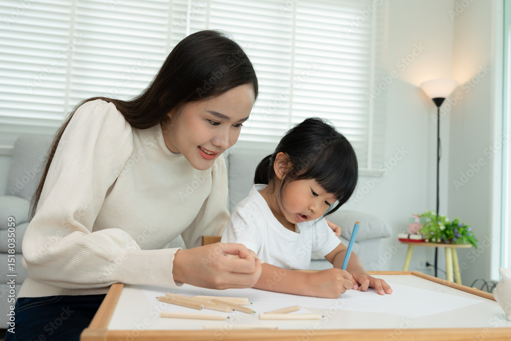 Happy Asia mother learning paint for little girl. family is happy and excited in the house. Mother and daughter having fun spending time together. Holiday, Activity, Executive Function, IQ, EQ Happy Asia mother learning paint for little girl. family is happy and excited in the house. Mother and daughter having fun spending time together. Holiday, Activity, Executive Function, IQ, EQ