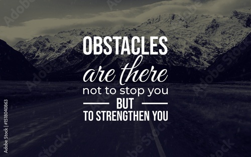 Canvas Print A motivational quote overlayed on a striking image of a mountain landscape, emphasizing the message of overcoming obstacles and finding strength