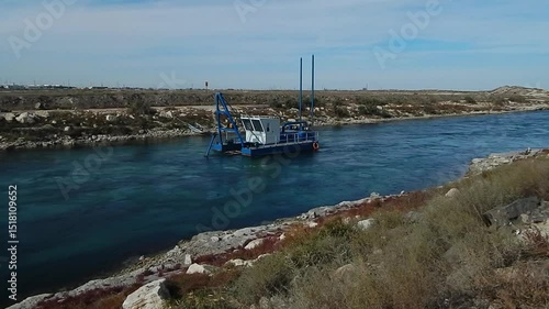 Dredge on the canal. October 20224 year. Water intake channel for the desalination of sea water. Kazakhstan. Mangistau region.