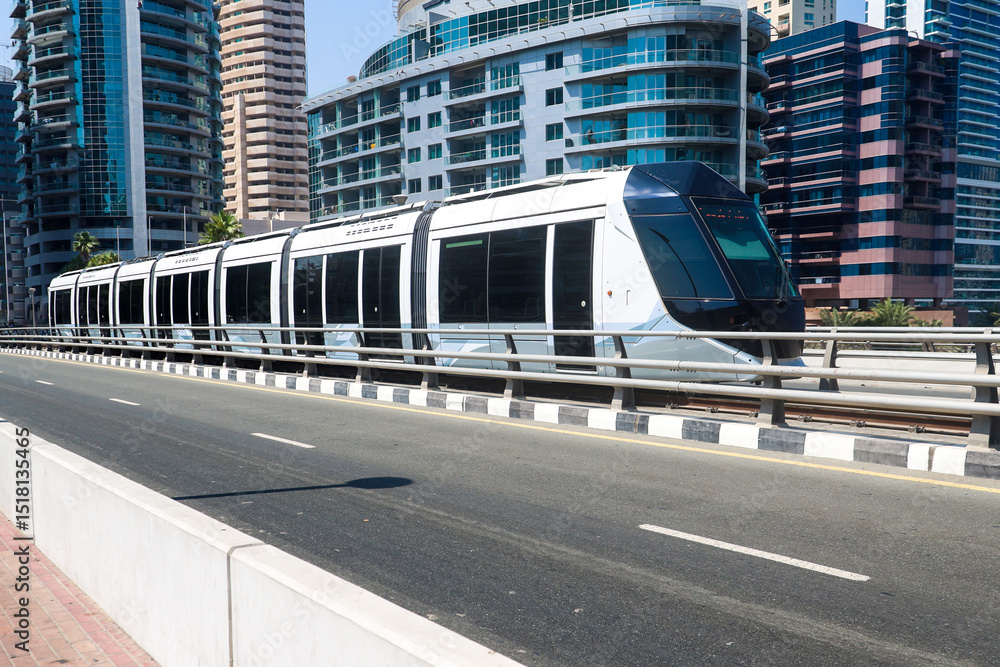 Naklejka premium Futuristic Driverless Tram Gliding Through the City Streets - A Vision of Modern Urban Transport.