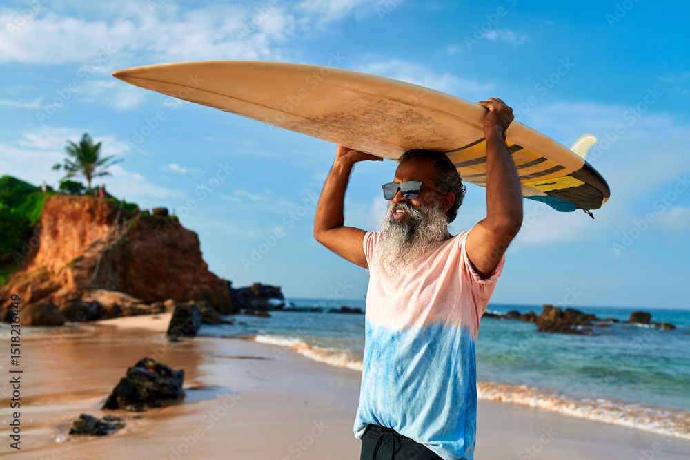 custom made wallpaper toronto digitalSenior man with surfboard walks on sandy beach. Elderly surfer embraces active lifestyle. Mature male enjoys ocean waves. Silver-haired sportsman finds joy in surfing. Healthy aging, vibrant life.