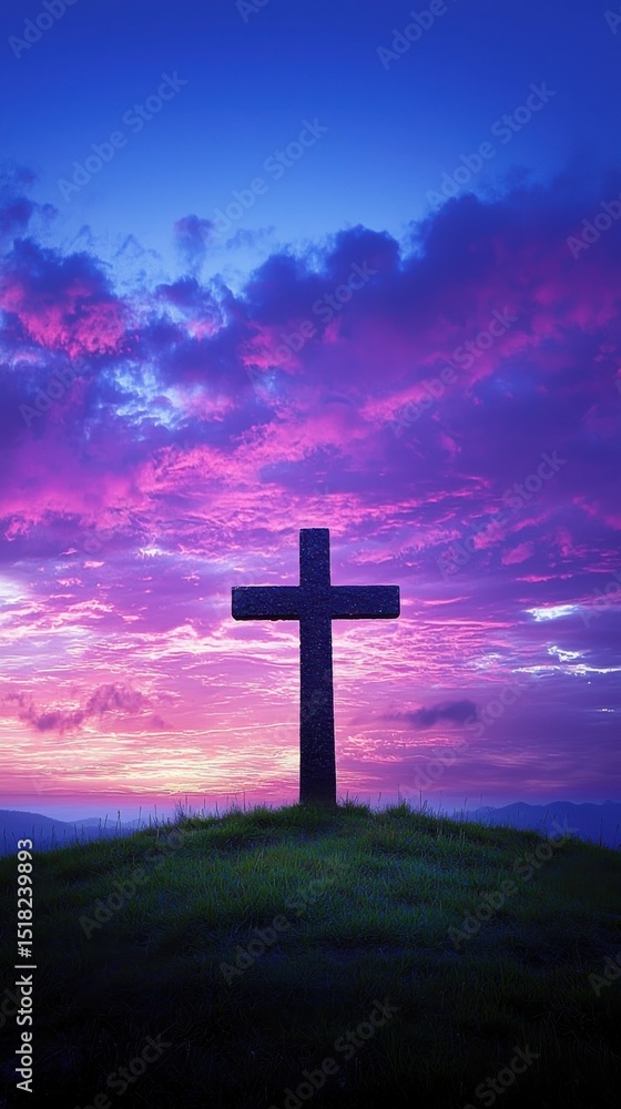 Beautiful scenic landscape with a silhouette of a cross standing on a grassy hill du vibrant sunset with colorful clouds in the sky Beautiful scenic landscape with a silhouette of a cross standing on a grassy hill du vibrant sunset with colorful clouds in the sky
