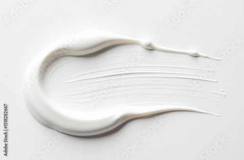 White cosmetic cream texture. Creamy skincare product swatch on white background. smear of paint