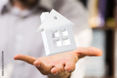 Image of a hand gently hold...