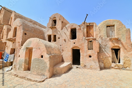 Scenic View of Ksar Ouled Soltane Against a Blue Desert Sky. Traditional Fortified Granary in Tunisia’s Tataouine Region, Showcasing Ancient Berber Architecture