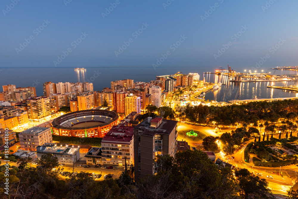 Obraz premium Malaga night view. A wonderful urban landscape of the city of Malaga in Spain. View after sunset, City panorama.