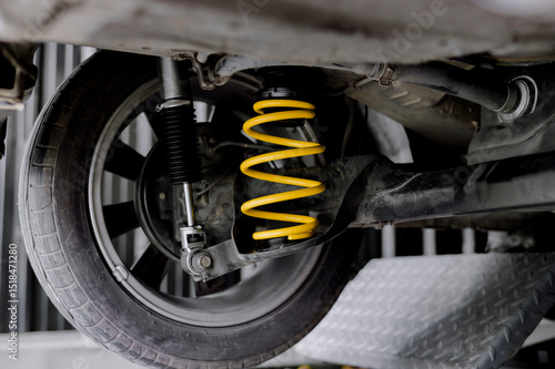 Yellow springs for cars.Upgrade your car's springs to be more efficient.Install new springs and shocks into the vehicle.Install springs and shocks on the back of the vehicle.