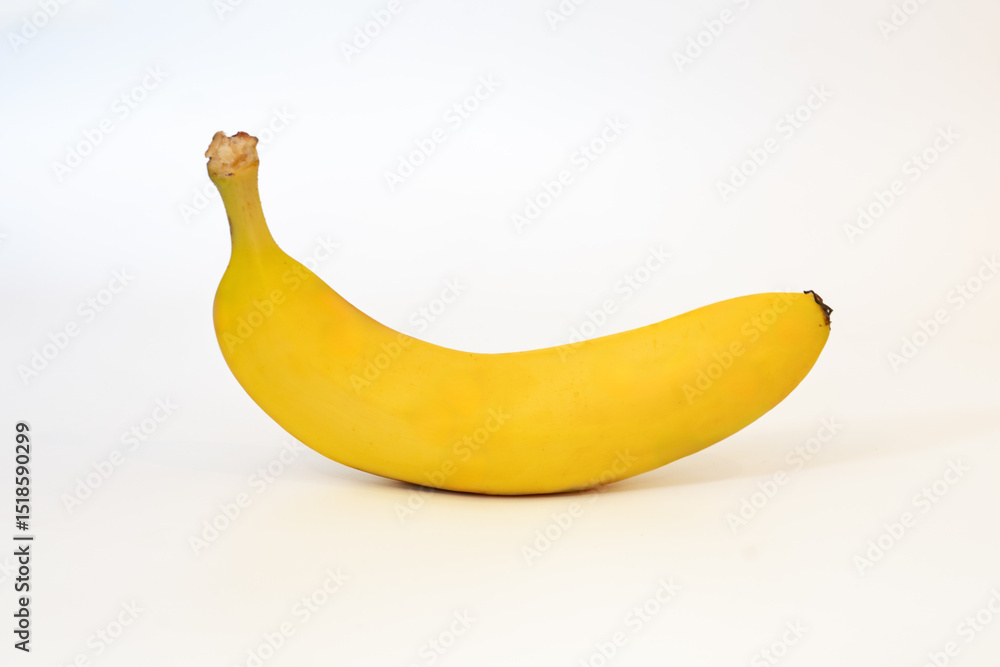 A single ripe banana isolated on white background A single ripe banana isolated on white background