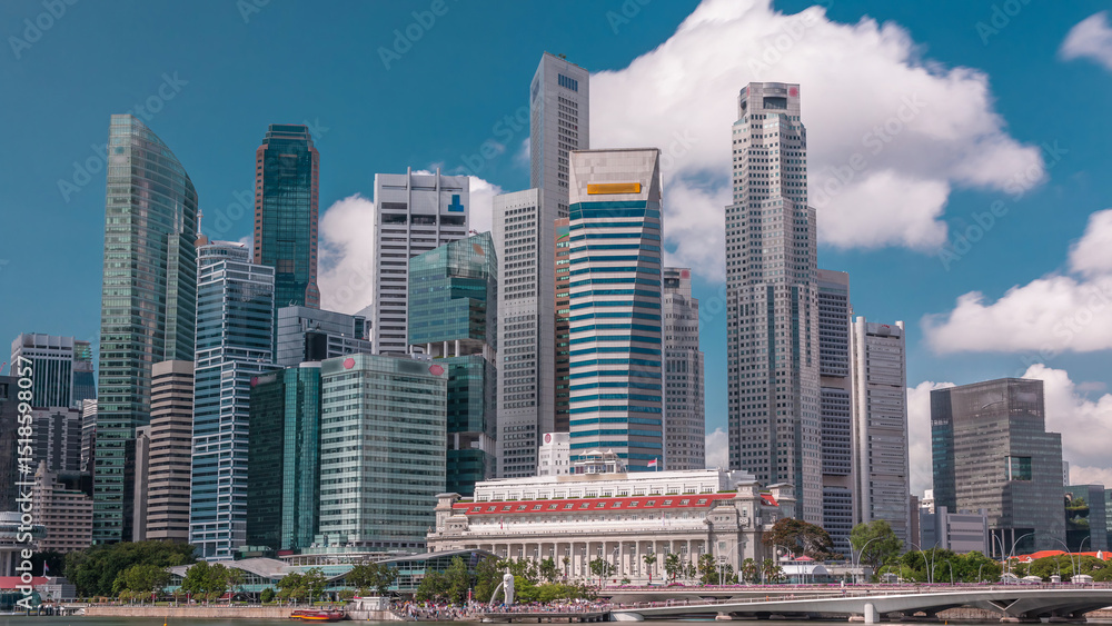 Naklejka premium Business Financial Downtown City and Skyscrapers Tower Building at Marina Bay timelapse, Singapore,