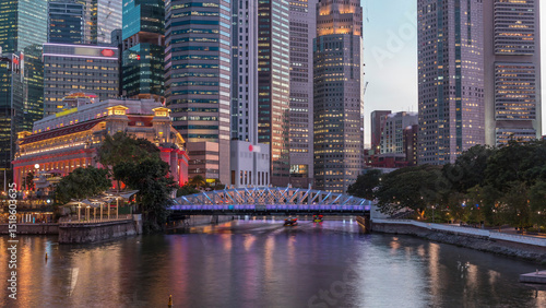 Photography Singapore skyscrapers skyline with white Anderson Bridge near esplanade park day to night timelapse