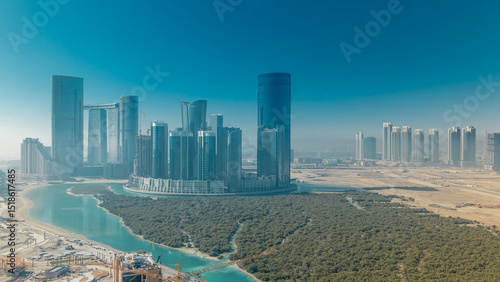 Buildings on Al Reem island in Abu Dhabi timelapse from above.