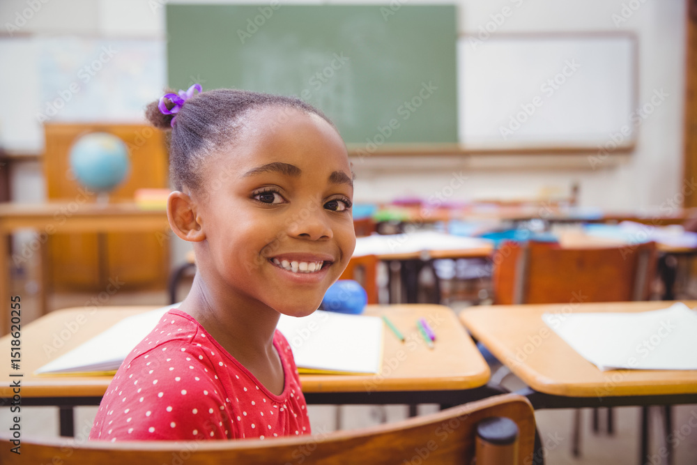 © WavebreakMediaMicro - African American schoolgirl sitting at desk in classroom with notebook and pencils, copy space © WavebreakMediaMicro - African American schoolgirl sitting at desk in classroom with notebook and pencils, copy space