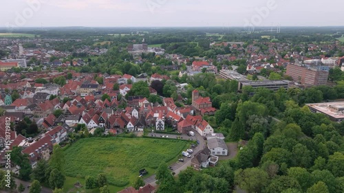 A panoramic drone view of the city and the castle, which sits on the water, in Steinfurt, Germany (Wasserschloss Burgsteinfurt)