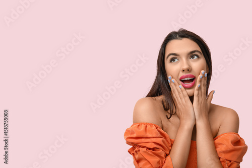 Beautiful young surprised w...