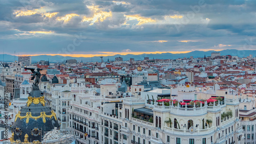 Panoramic aerial view of Gran Via timelapse before sunset, Skyline Old Town Cityscape, Metropolis Building, capital of Spain