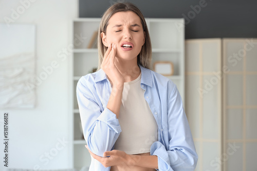 Young woman suffering from ...