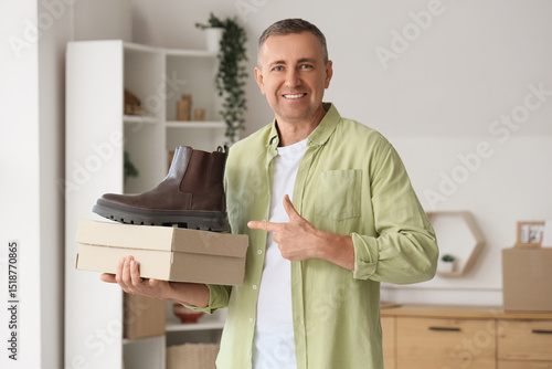 Mature man with new boots a...