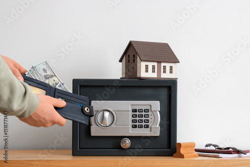 Man with wallet of money an...