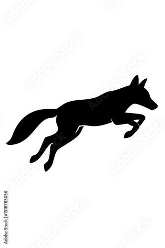 Silhouette of a Fox Leaping Through the Air During a Hunting Chase at Dusk