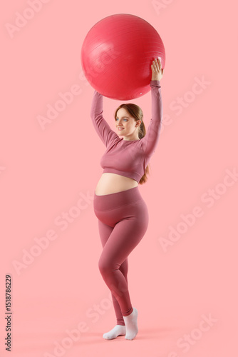 Sporty young pregnant woman...