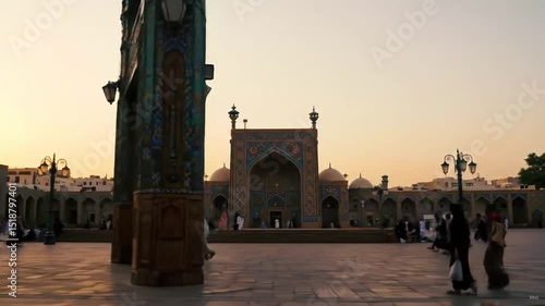 Exploring Naqsh-e Jahan Square in Isfahan, Iran at Sunset with People Strolling