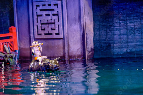 Traditional Vietnamese water puppet dolls theatre show in Hanoi, Vietnam, water puppetry doll show, in Thang Long theatre , one of the most traditional water puppet show in Hanoi, Vietnam.