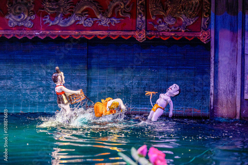 Traditional Vietnamese water puppet dolls theatre show in Hanoi, Vietnam, water puppetry doll show, in Thang Long theatre , one of the most traditional water puppet show in Hanoi, Vietnam.