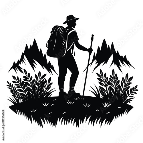 Silhouette of a hiker in the mountains with a backpack and walking stick