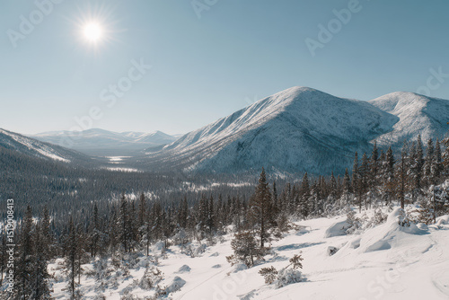 breathtaking view of ural mountains illuminated by bright sunlight showcasing majestic peaks and valleys